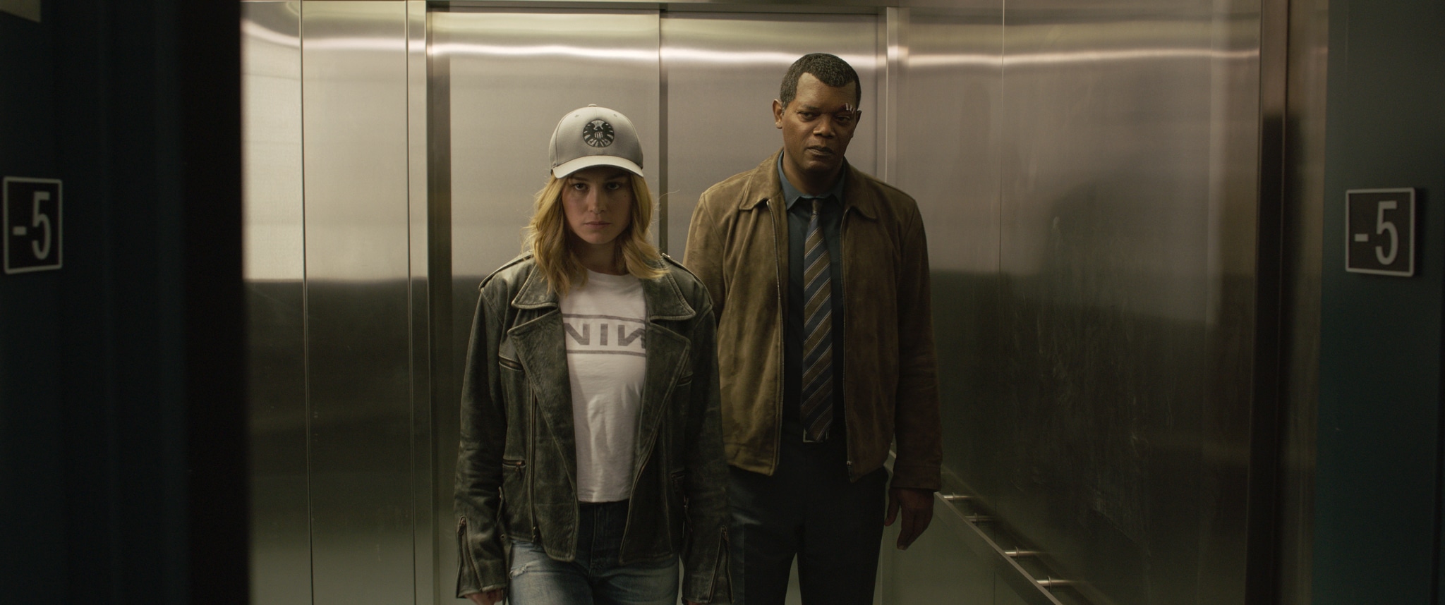 Samuel L. Jackson and Brie Larson as Nick Fury and Captain Marvel.