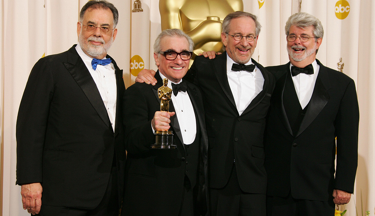 Los Angeles, UNITED STATES: Martin Scorsese (2L), the winner for Best Director for his work on "The Departed," poses with his Oscar trophy with film director Steven Spielberg (2R), film director George Lucas (R) and film director Francis Ford Coppola (L), who presented him with the award at the 79th Academy Awards in Hollywood, California, 25 February, 2007. AFP PHOTO Robyn BECK (Photo credit should read ROBYN BECK/AFP/Getty Images)