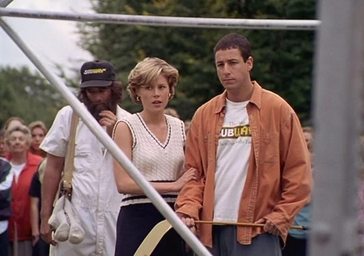 Adam Sandler and Julie Bowen in Happy Gilmore (1996)