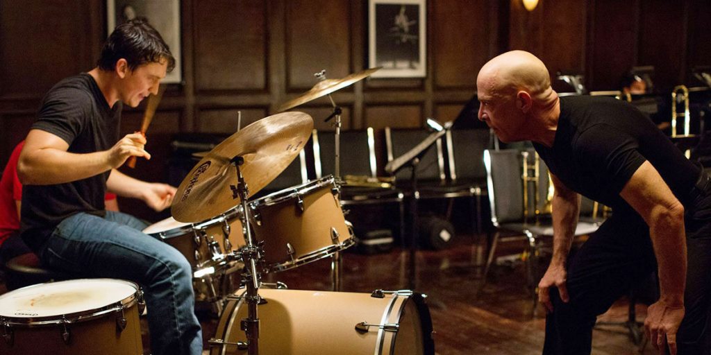 Miles Teller and J. K. Simmons in Whiplash Movies