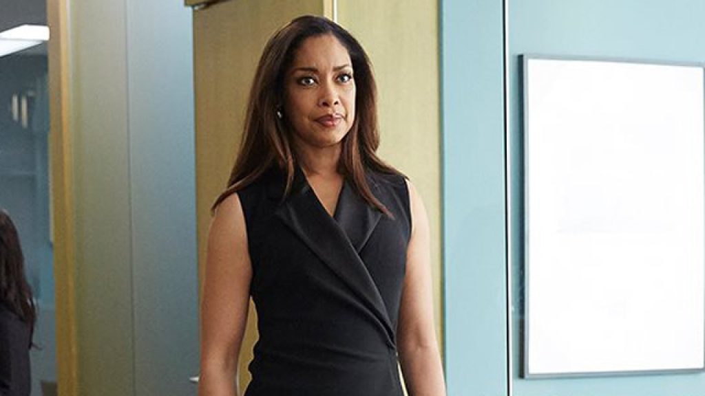 Gina Torres giving an intense look in Suits