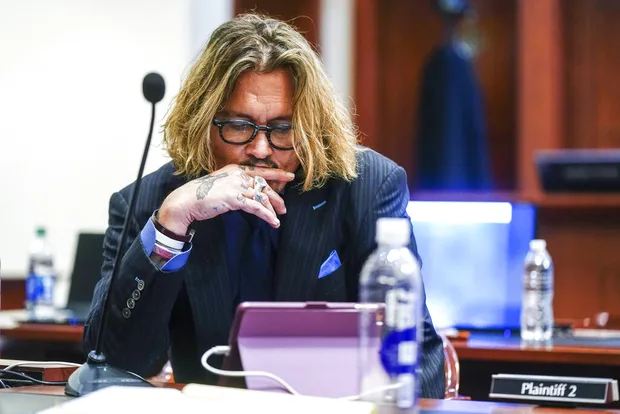 Actor-Johnn-Depp-sits-in-the-courtroom-at-the-Fairfax-County-Circuit-Courthouse-in-Fairfax
