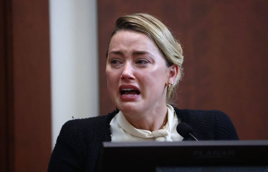 Amber Heard crying in court.
