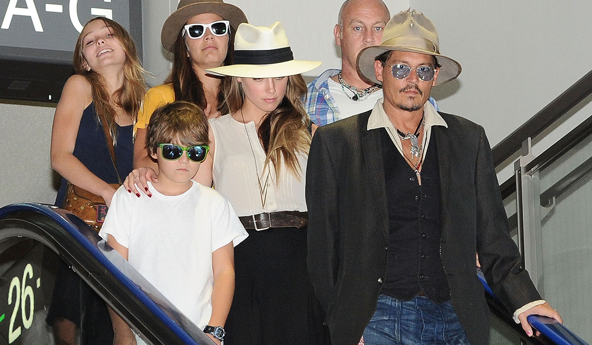 Johnny Depp with Amber Heard and his children.