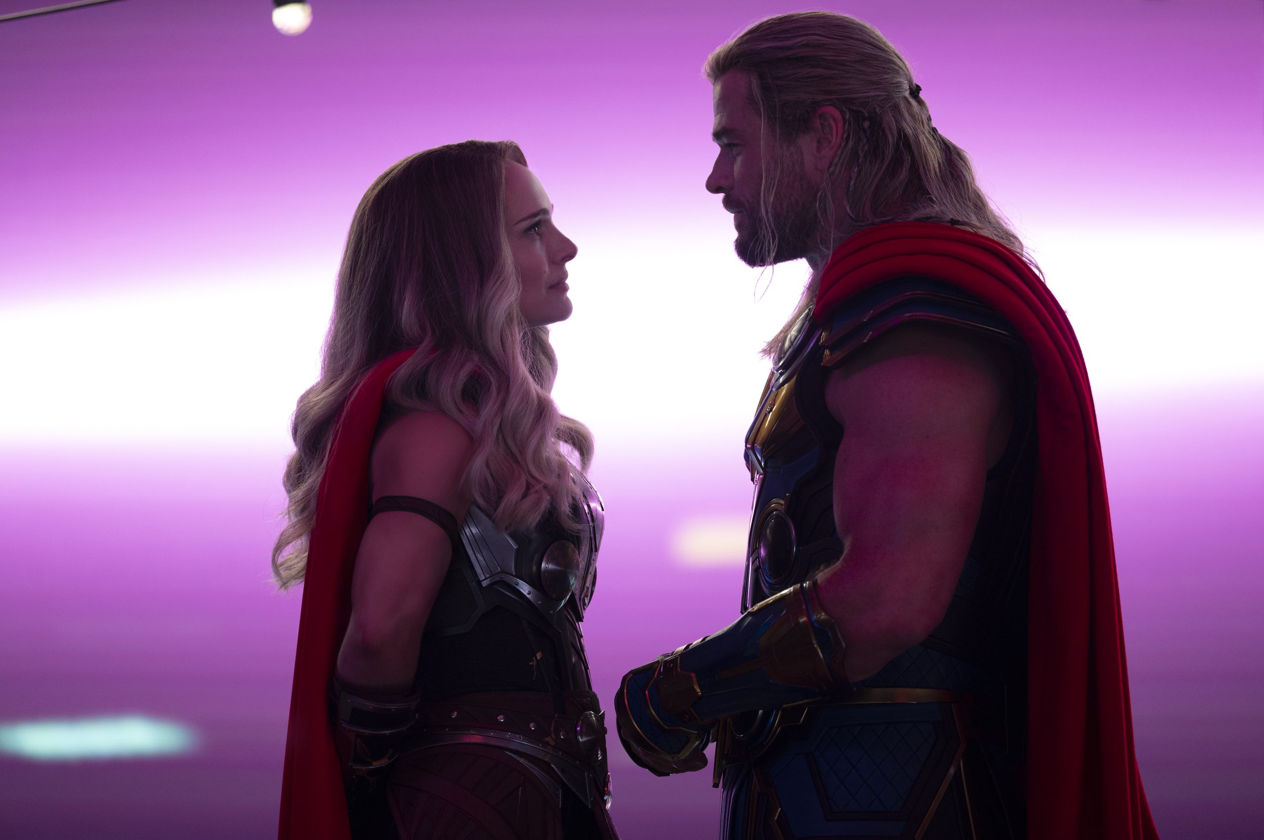 Natalie Portman as Mighty Thor and Chris Hemsworth as Thor in Marvel Studios' THOR: LOVE AND THUNDER. 