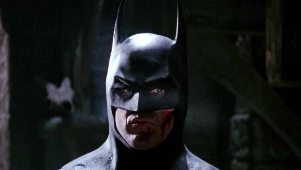 Michael Keaton may don the blue batsuit as Batman in the Flash