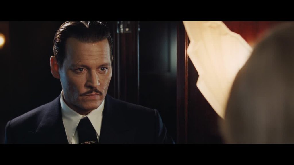 Johnny Depp as Edward Ratchett in Murder on the Orient Express (2017).