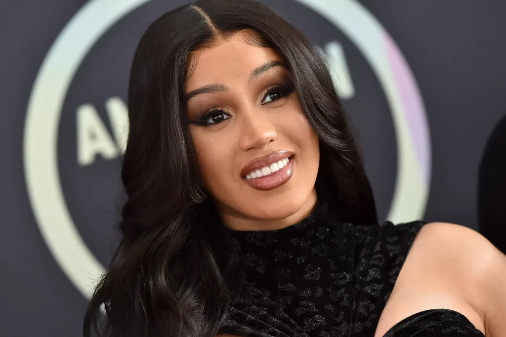 Cardi B smiling for the cameras.