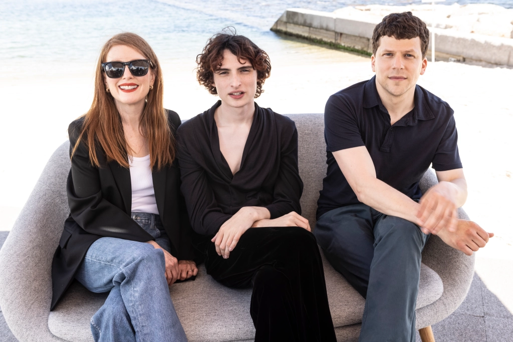Jesse Eisenberg (far right) along with the lead stars Finn Wolfhard (middle) and Julianne Moore (left).