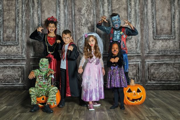 Kids in their Halloween costumes 