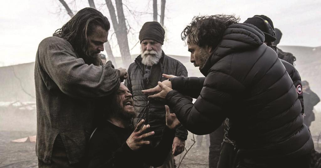 Alejandro G. Iñárritu, Leonardo DiCaprio, and Tom Hardy from a behind the scene still from The Revenant