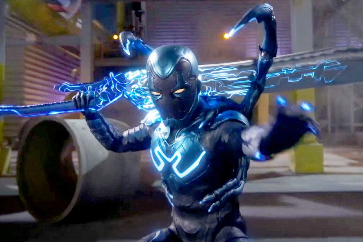 Blue Beetle holding his sword in this scene 