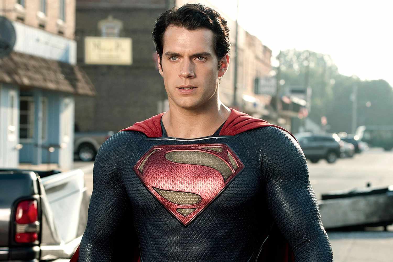 Henry Cavill looking on as Superman