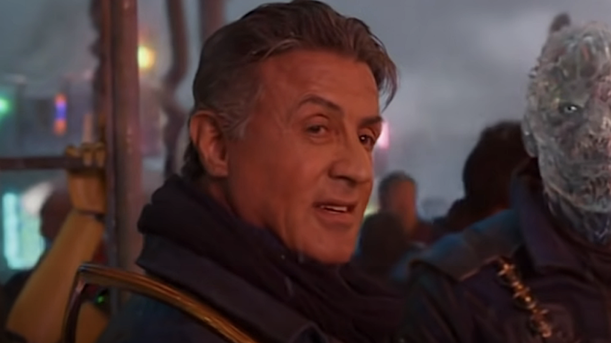 Sylvester Stallone smiling here