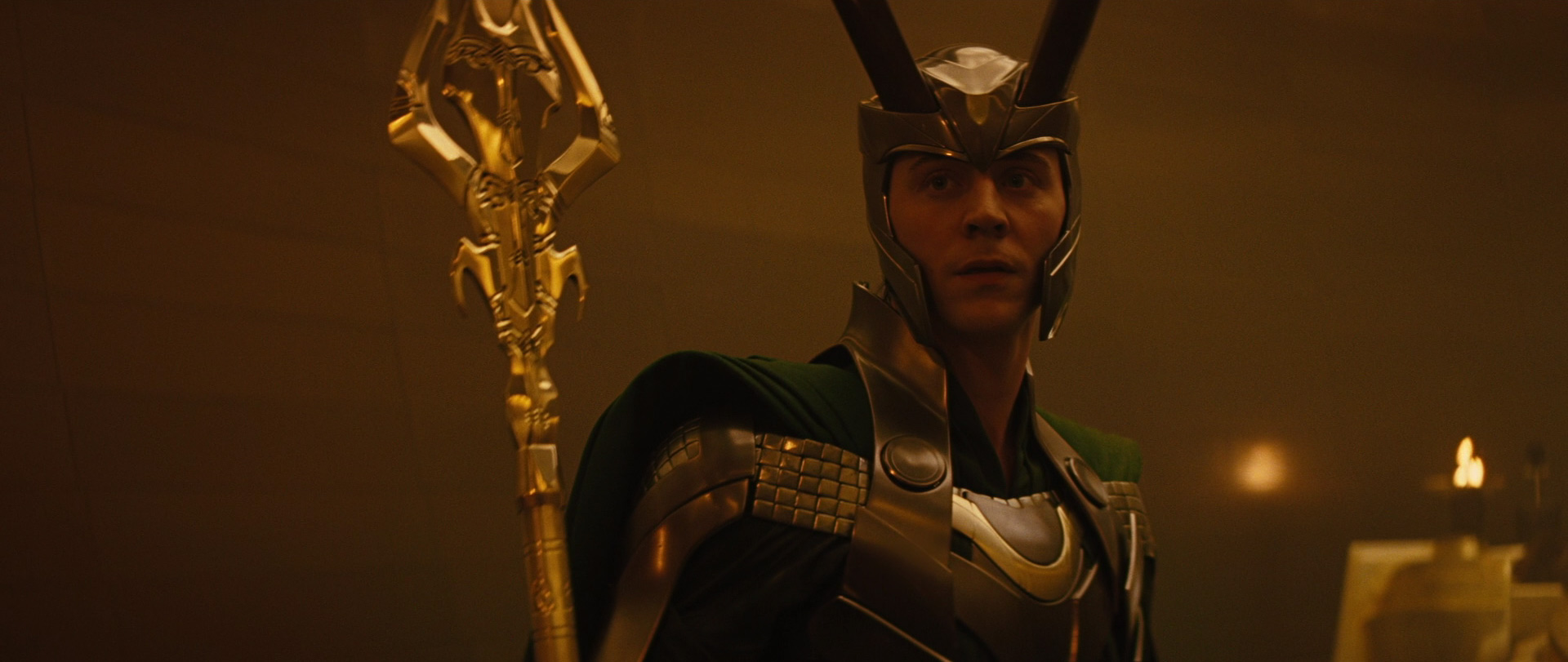 Tom Hiddleston looking on in Thor