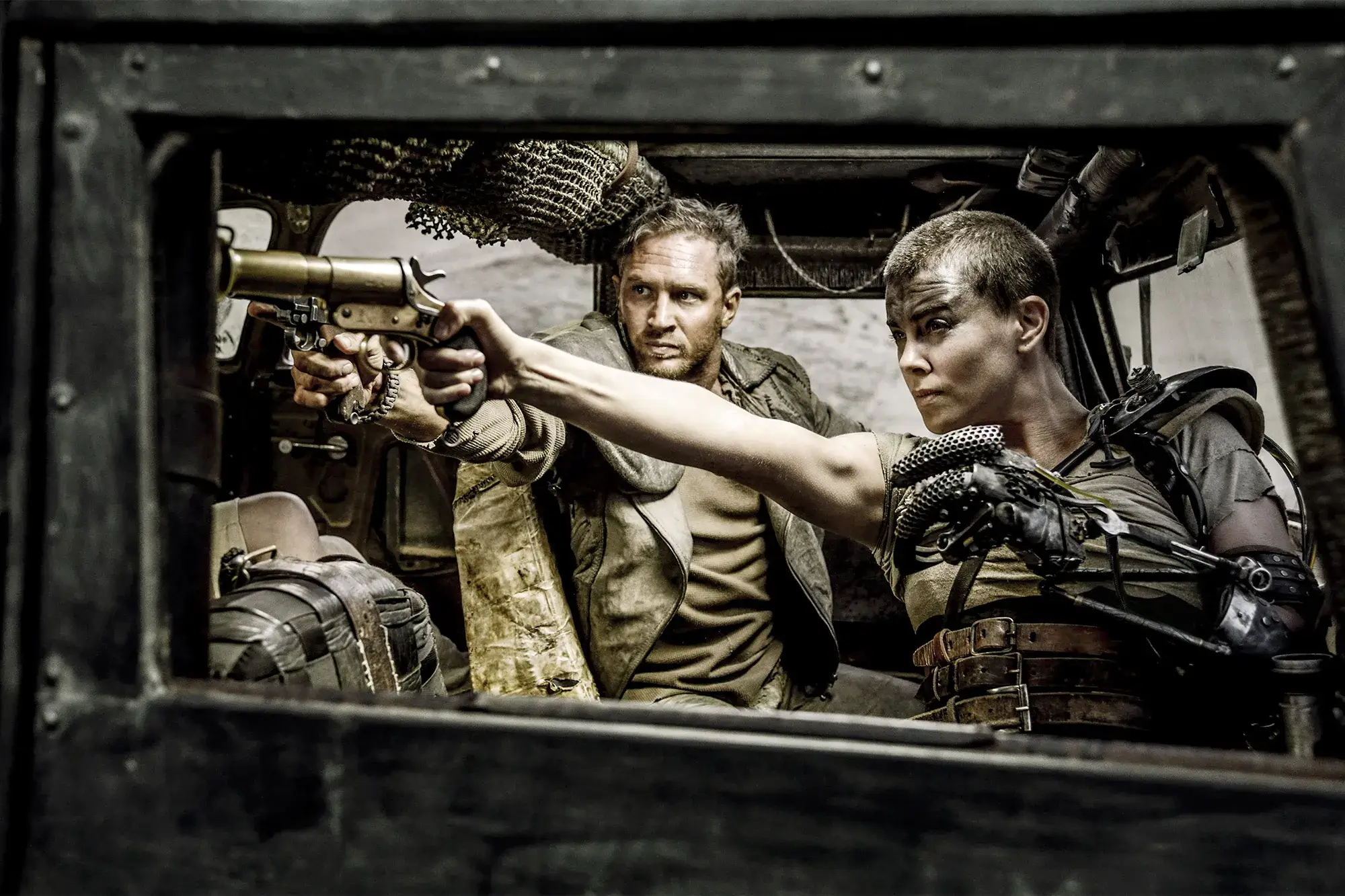 Charlize Theron with Tom Hardy in a still from Mad Max: Fury Road (2015)