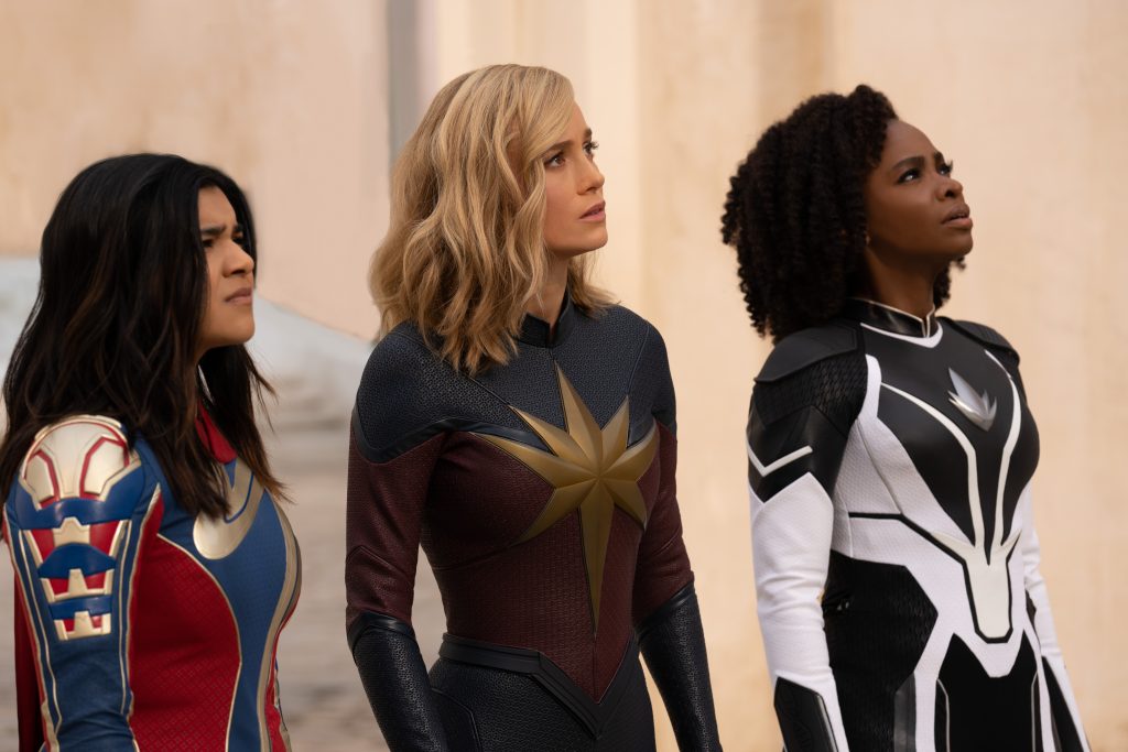 (L-R): Iman Vellani as Ms. Marvel/Kamala Khan, Brie Larson as Captain Marvel/Carol Danvers, and Teyonah Parris as Captain Monica Rambeau in Marvel Studios' THE MARVELS. 