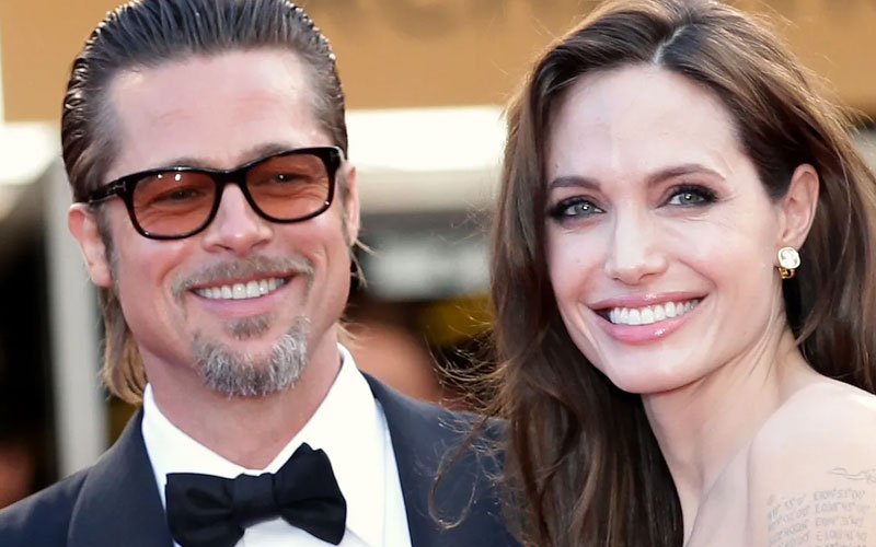 Brad Pitt and Angelina Jolie smiling