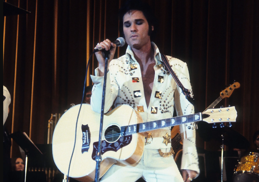 Kurt Russell as Elvis Presley 