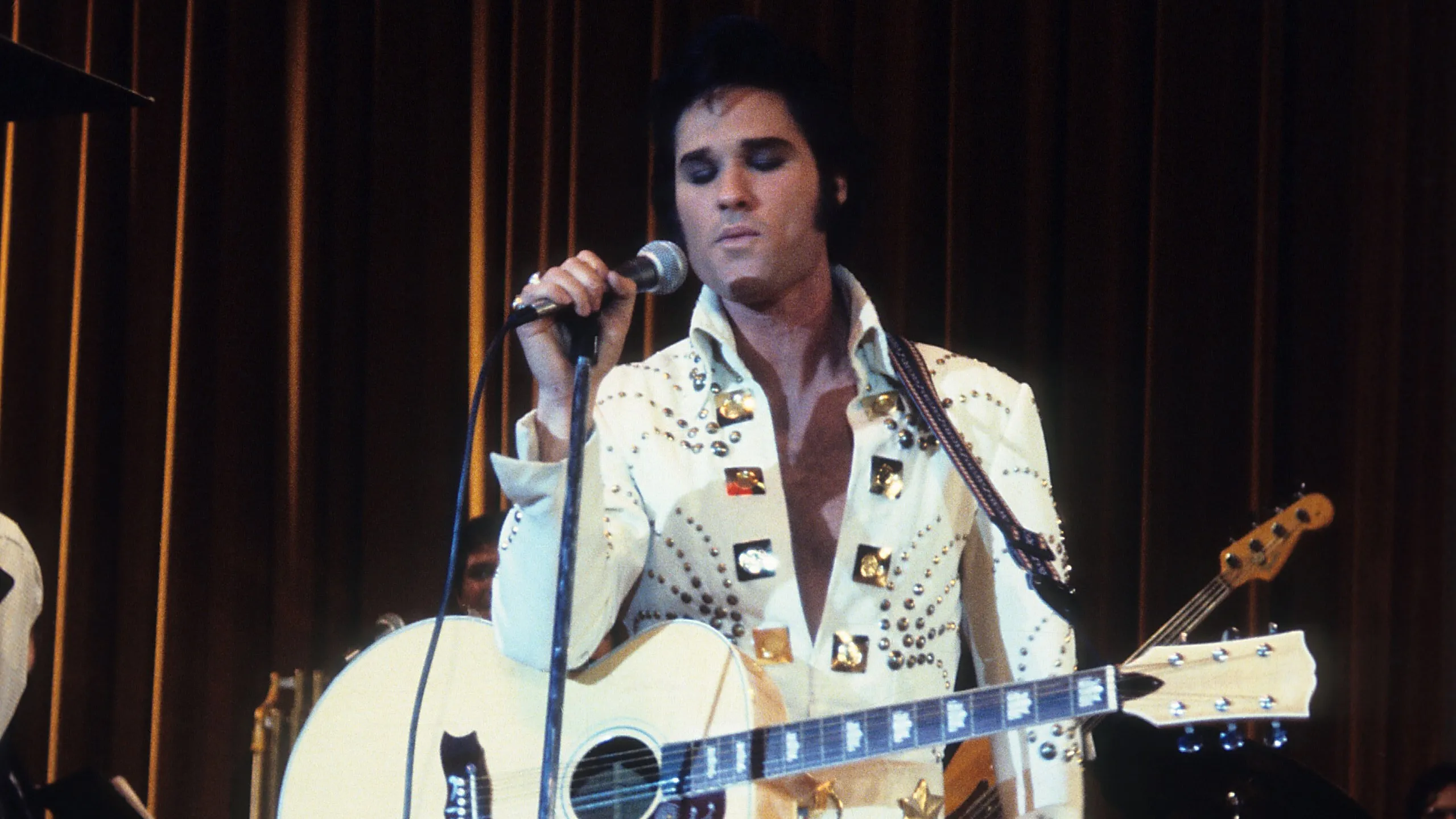 Kurt Russell as Elvis Presley