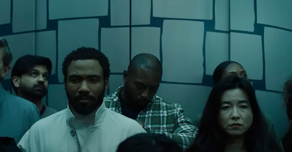  Donald Glover as John Smith and Maya Erskine as Jane Smith in Mr. & Mrs. Smith